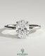 Kynora CJ 2ct oval claw solitaire engagement ring with hidden halo and floating cathedral low setting, showcasing elegant jewelry design.