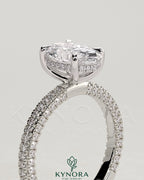 Kynora CJ 2ct oval claw solitaire engagement ring with hidden halo and triple pave band, featuring a sparkling central diamond.