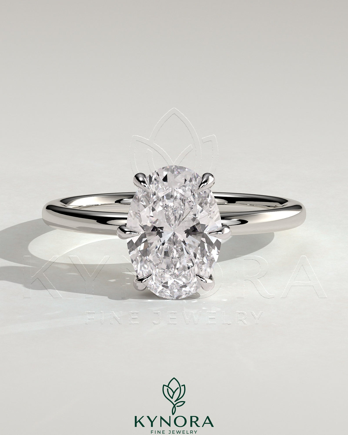 Kynora CJ 2ct oval claw solitaire engagement ring with hidden halo, showcasing a sparkling oval diamond and elegant design.