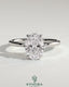 Kynora CJ 2ct oval claw solitaire engagement ring with hidden halo, showcasing a sparkling oval diamond and elegant design.