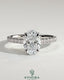 Kynora CJ 2ct oval claw solitaire engagement ring with hidden halo, pave band, and cathedral high setting, showcasing elegant jewelry design.