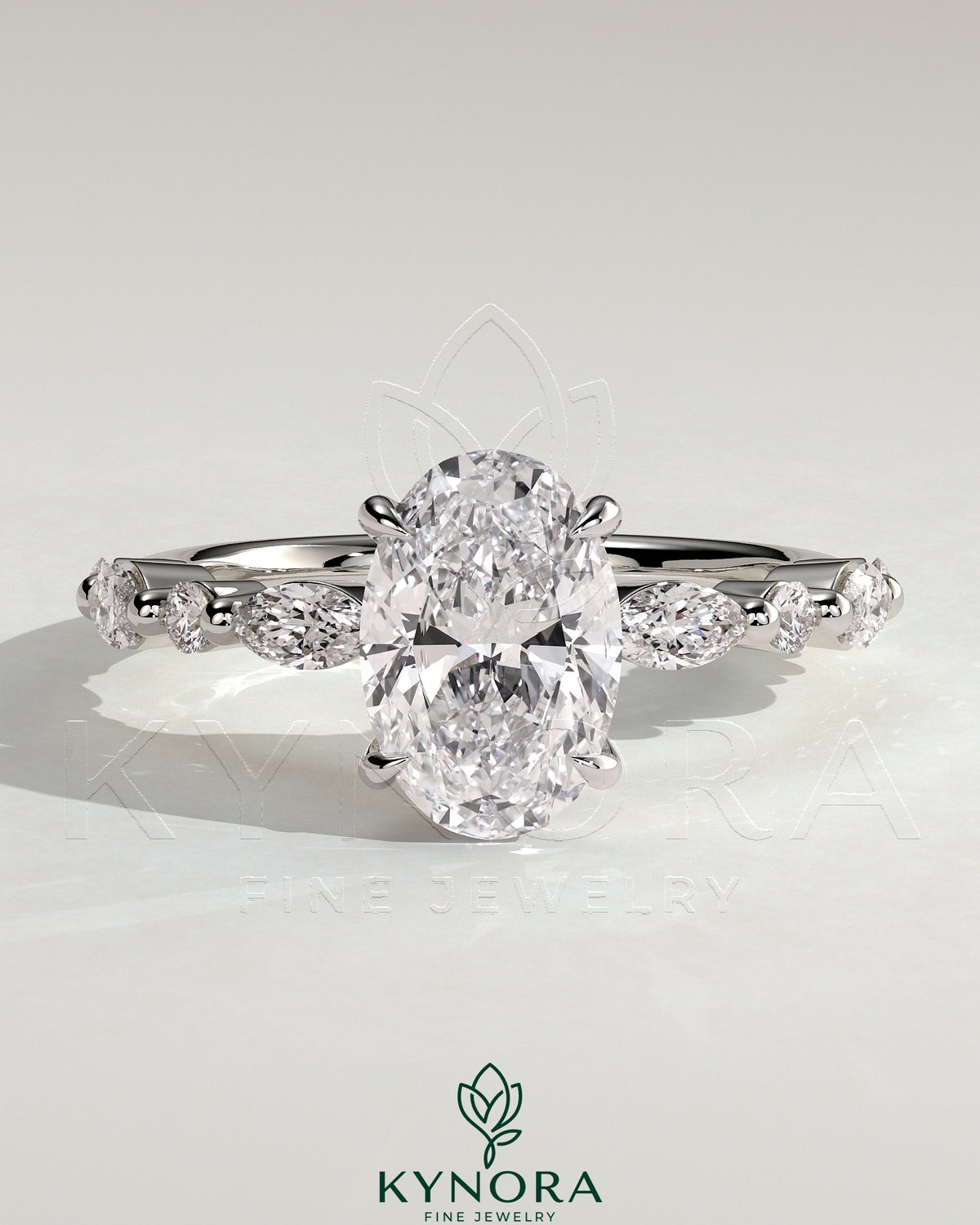 Kynora CJ 2ct oval claw solitaire engagement ring with marquise and round accent stones, featuring a sleek platinum band. Main image
