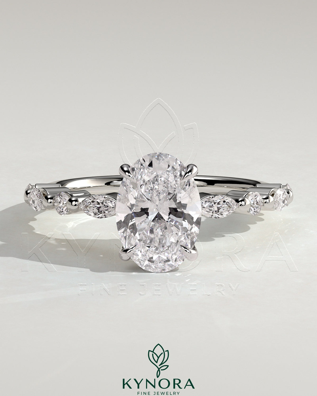 Kynora CJ 2ct oval claw solitaire engagement ring with marquise-round accents and a hidden halo, showcasing elegant jewelry design. Main image