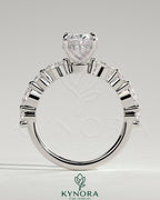 Kynora CJ 2ct oval claw solitaire engagement ring with marquise and round accent stones, hidden halo, elegant jewelry design