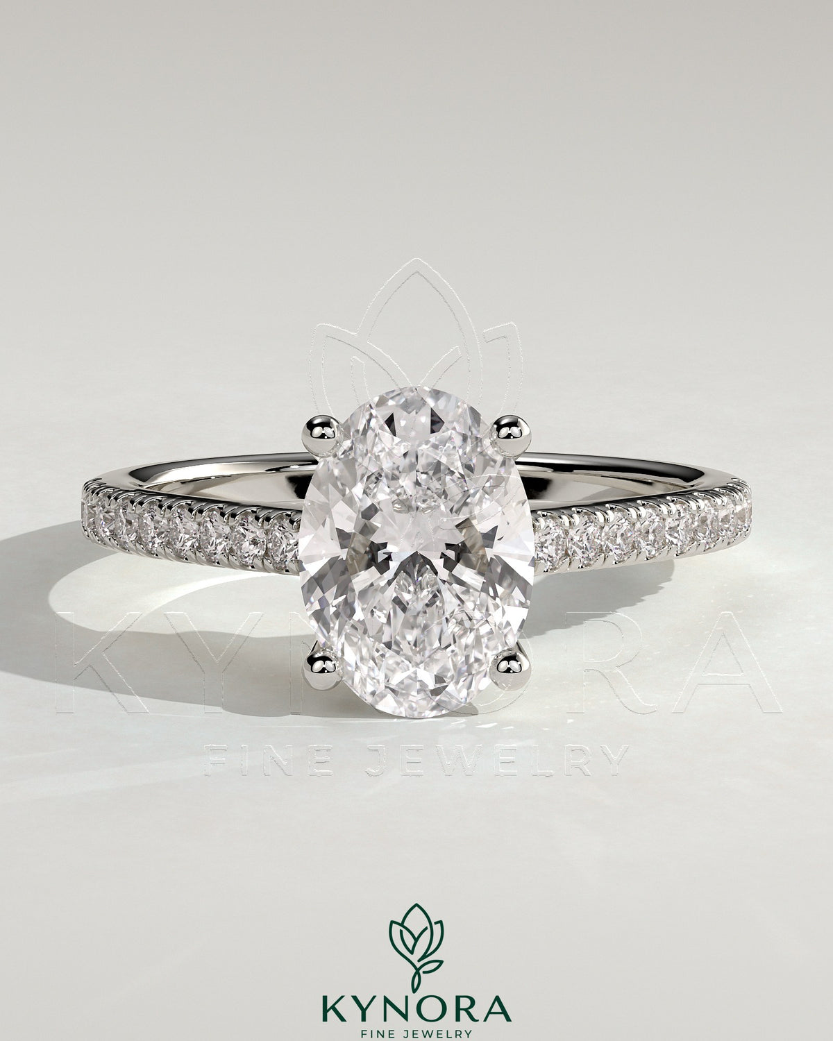 Kynora CJ 2ct oval claw solitaire engagement ring with pave band and cathedral low setting in shining gold. Main image