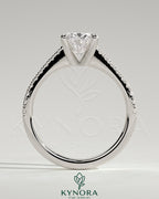 Kynora CJ 2ct oval claw solitaire engagement ring with pave band and cathedral low setting in sterling silver.