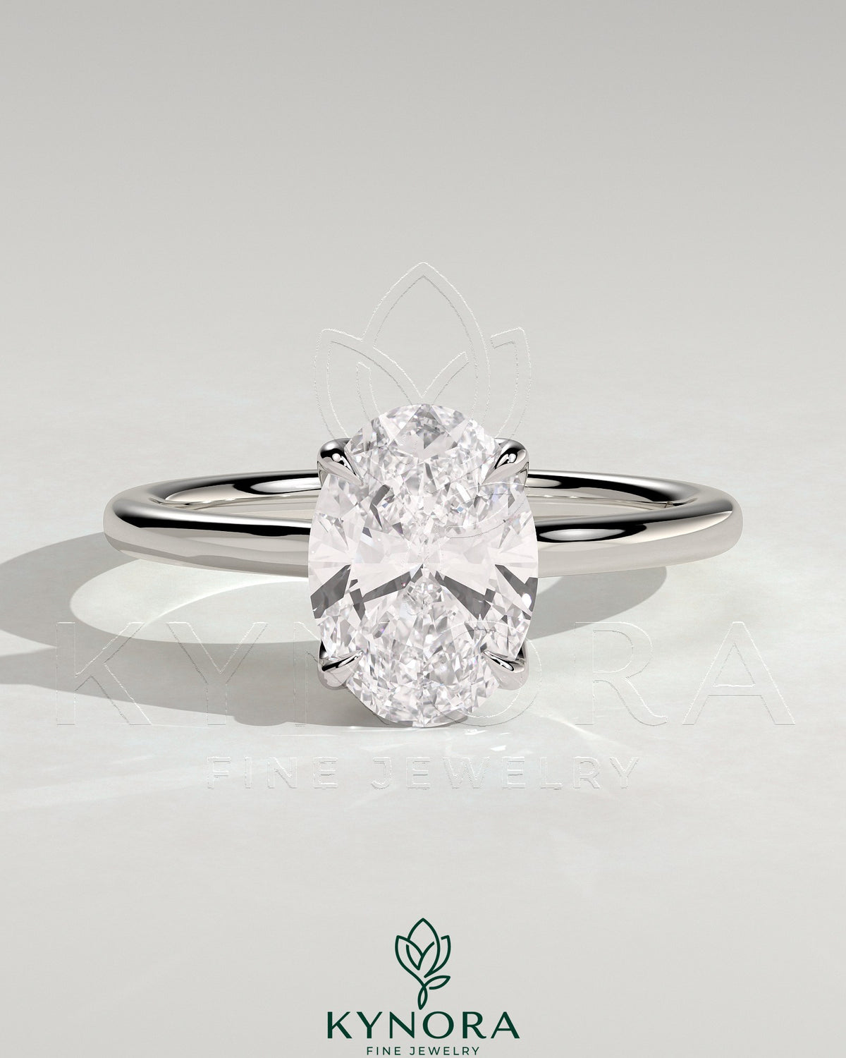 Kynora CJ 2ct oval claw solitaire engagement ring with petal gallery, leaf accents, and cathedral setting in gold. Main image