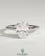 Kynora CJ 2ct oval claw solitaire engagement ring with petal gallery, leaf accents, and cathedral setting in gold.