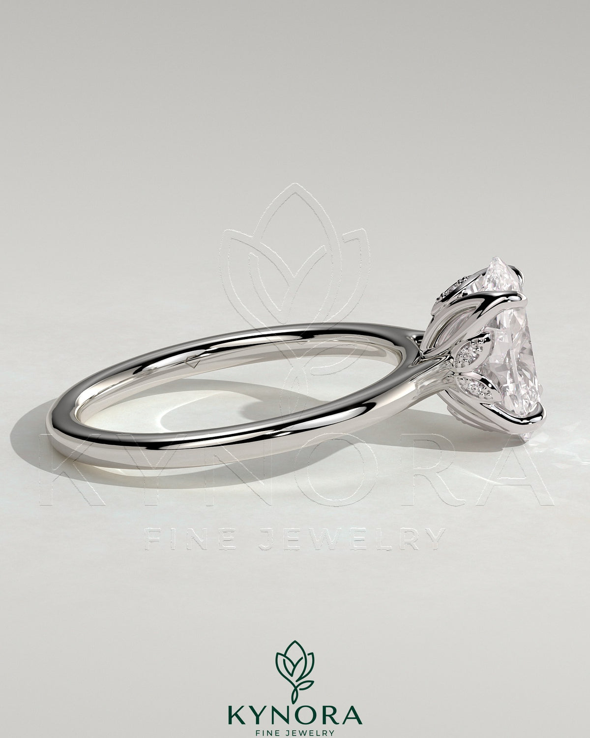 Kynora CJ 2ct oval claw solitaire engagement ring with petal gallery, leaf accents, and cathedral setting in sterling silver.