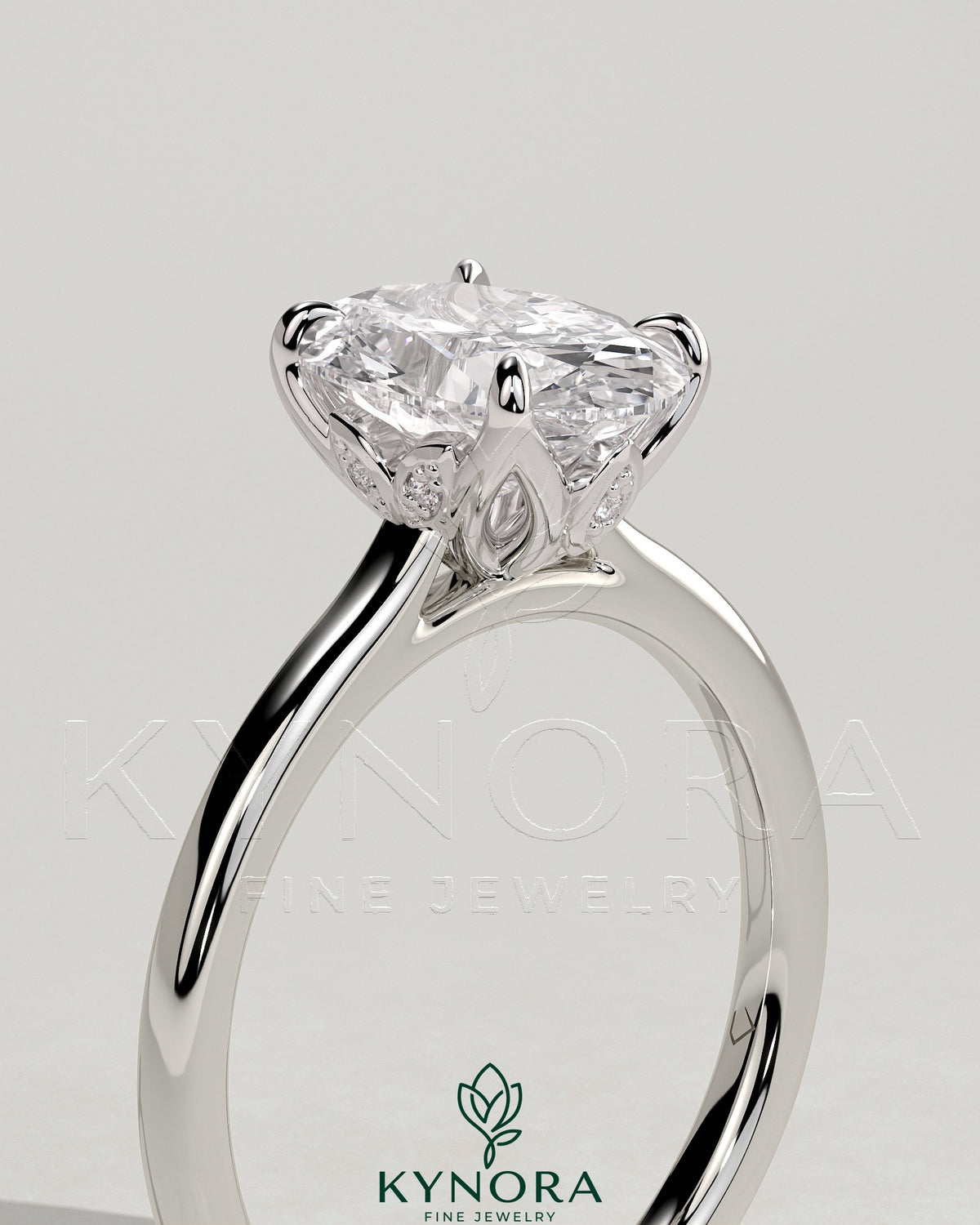 Kynora CJ 2ct oval claw solitaire engagement ring with petal gallery, leaf accents, and cathedral setting in gold.