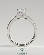 Kynora CJ 2ct oval claw solitaire engagement ring with split shank and cathedral high setting, showcasing elegant diamond design.