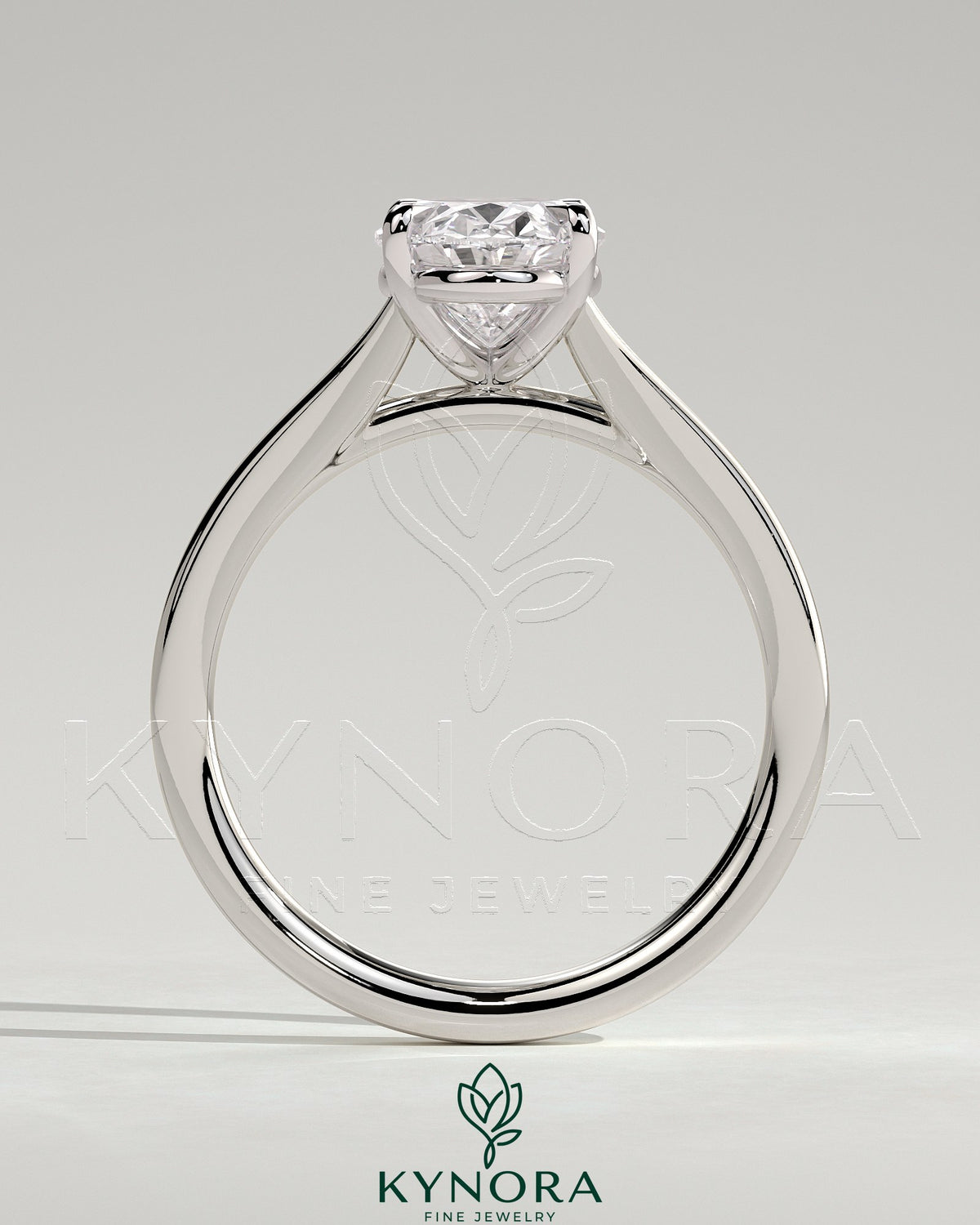 Kynora CJ 2ct oval claw solitaire engagement ring with split shank and cathedral high setting, showcasing elegant diamond design.