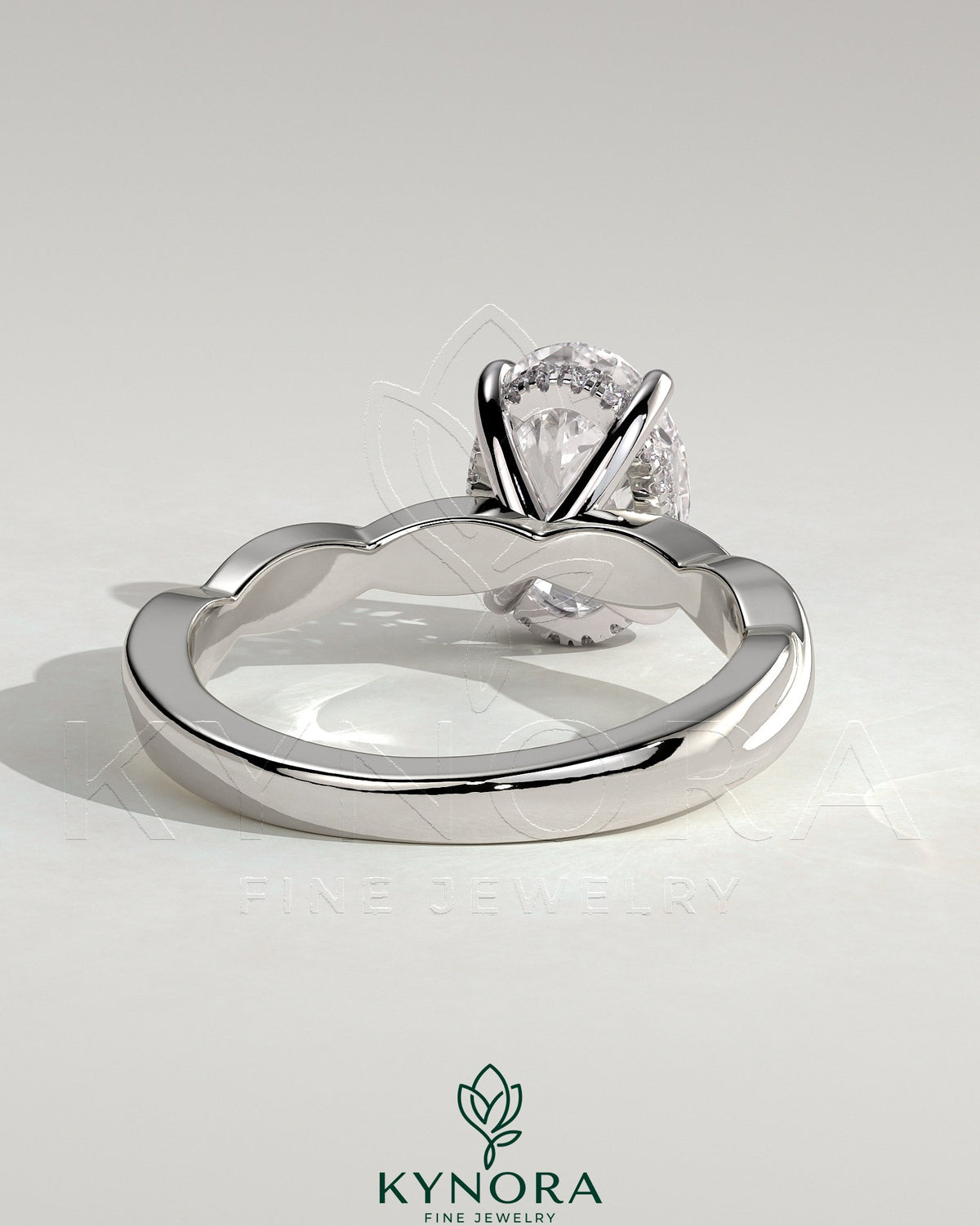 Kynora CJ 2ct oval claw solitaire engagement ring with twisted band in sterling silver, featuring a prominent oval diamond setting.