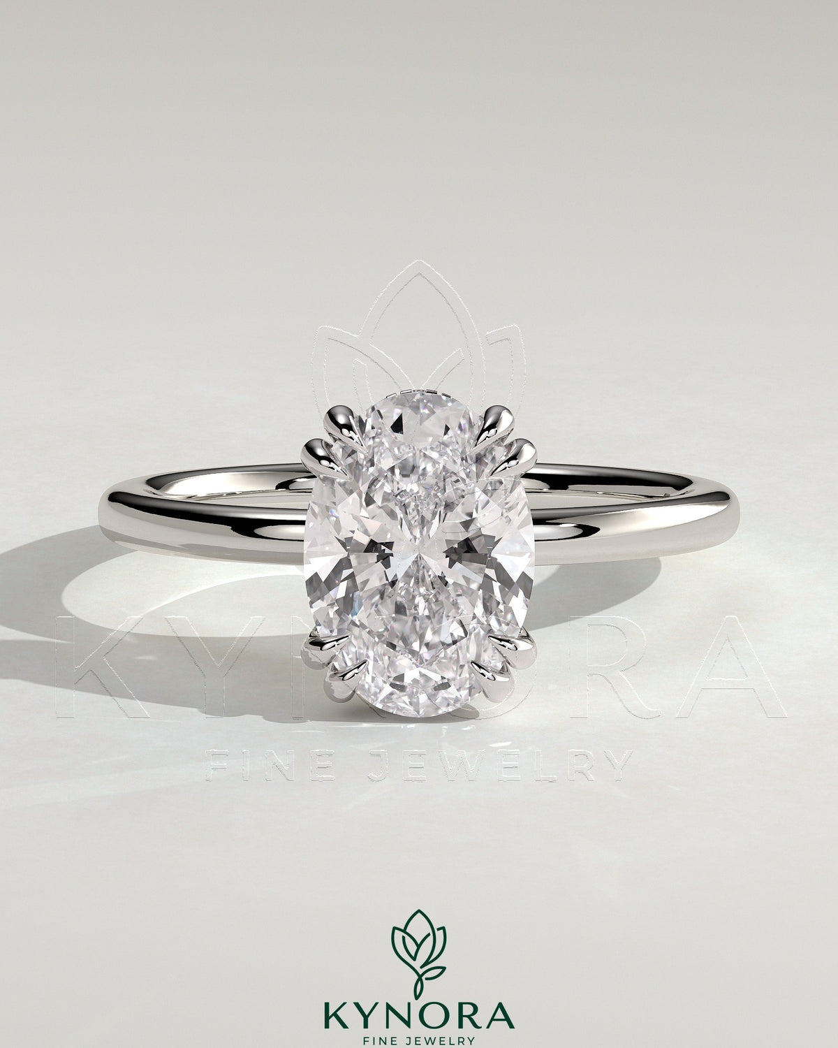 Kynora CJ 2ct oval double claw solitaire engagement ring with hidden halo, showcasing elegant diamond setting and sparkling design.