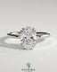 Kynora CJ 2ct oval double claw solitaire engagement ring with hidden halo, showcasing elegant diamond setting and sparkling design.