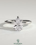 Kynora CJ 2ct pear-shaped diamond solitaire engagement ring with five prongs in a close-up view.