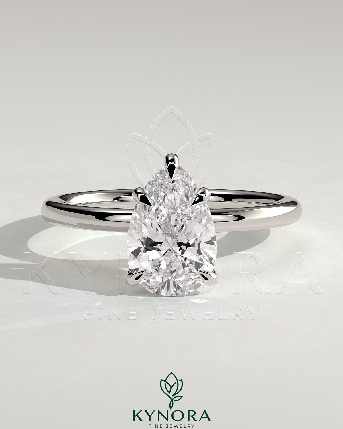 Kynora CJ 2ct pear-shaped diamond solitaire engagement ring with five prongs in a close-up view.
