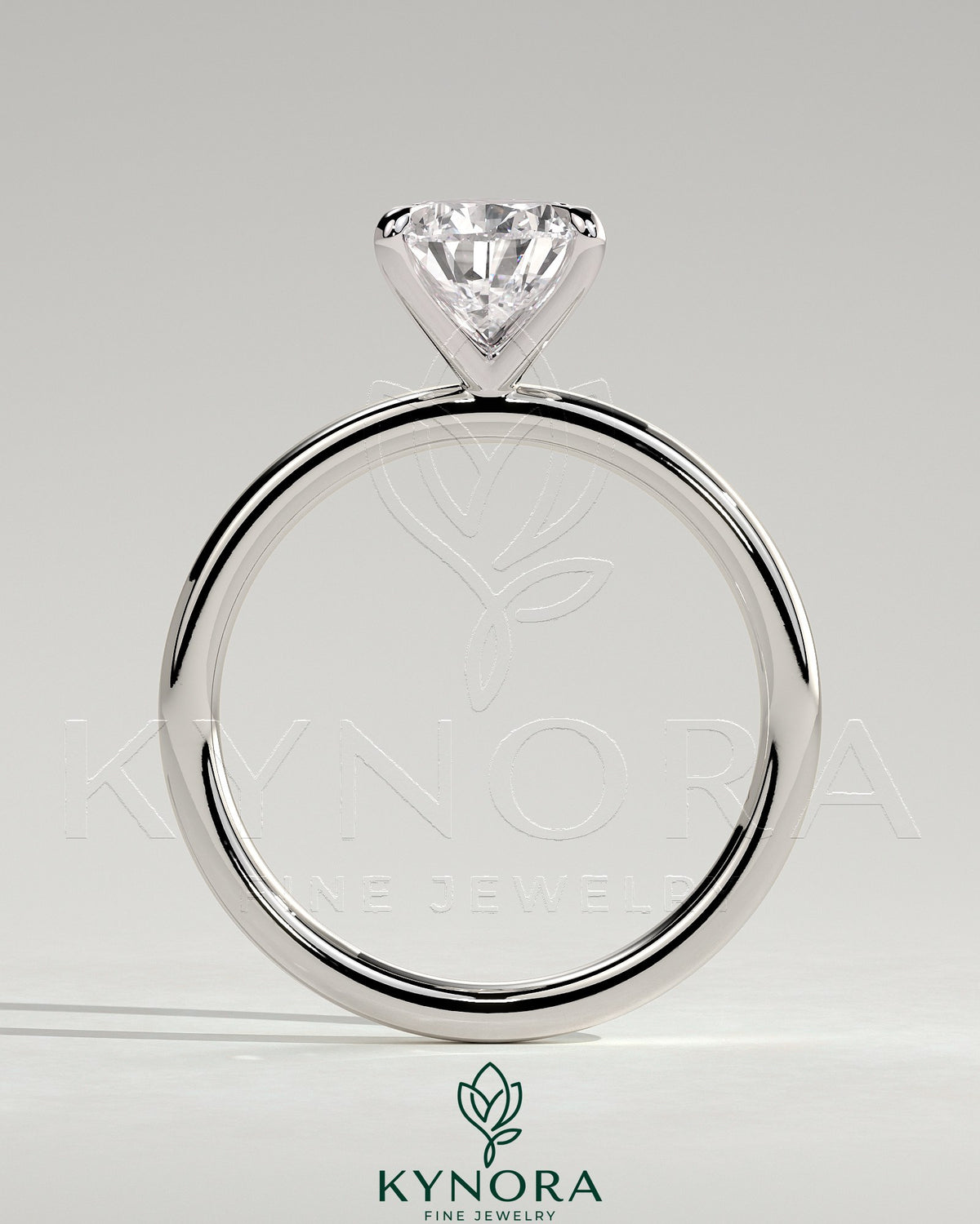 Kynora CJ 2ct pear-shaped diamond solitaire engagement ring with five prongs on a silver band.