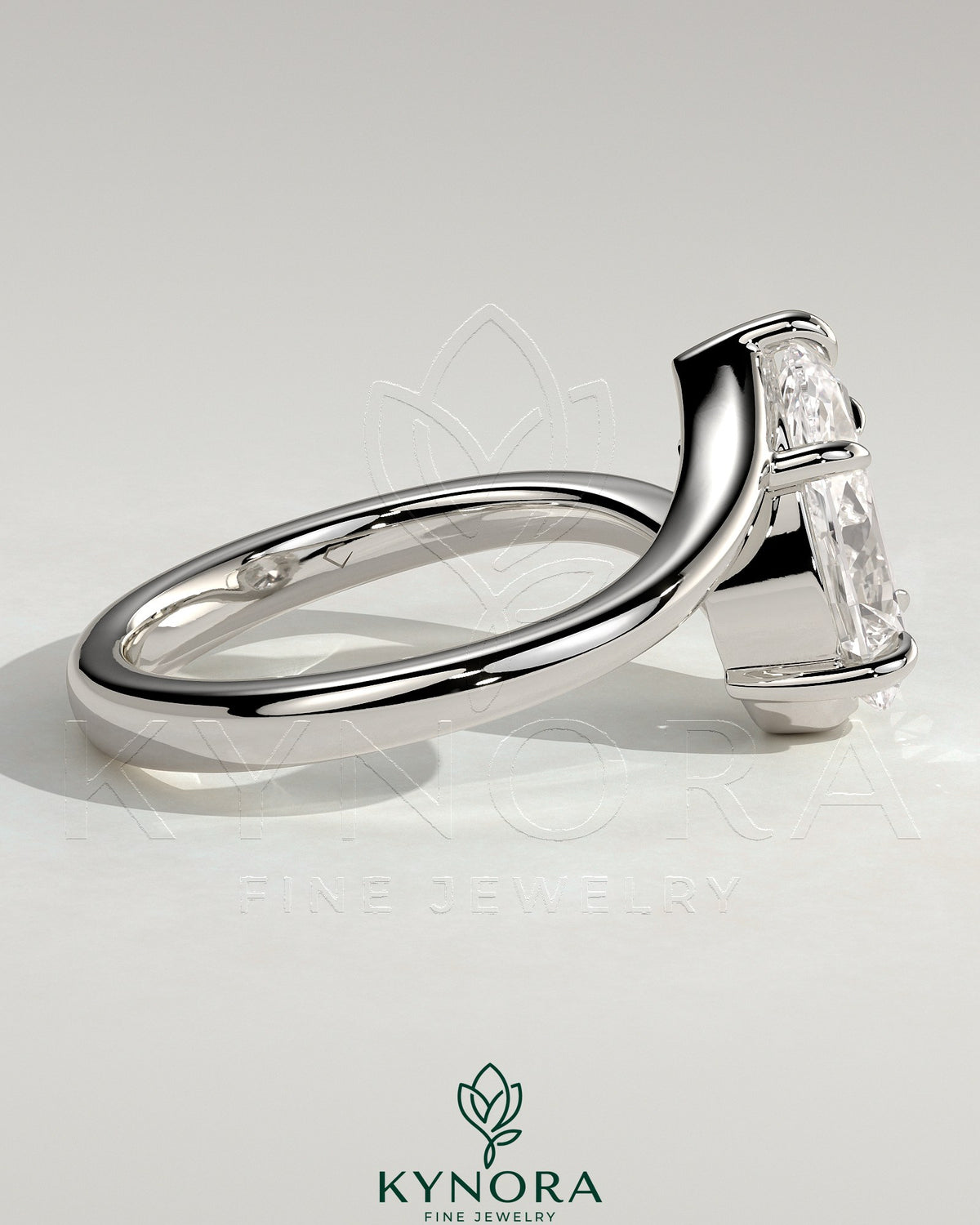 Kynora CJ 2ct pear-shaped diamond solitaire engagement ring with bypass band, featuring a sleek and elegant design.