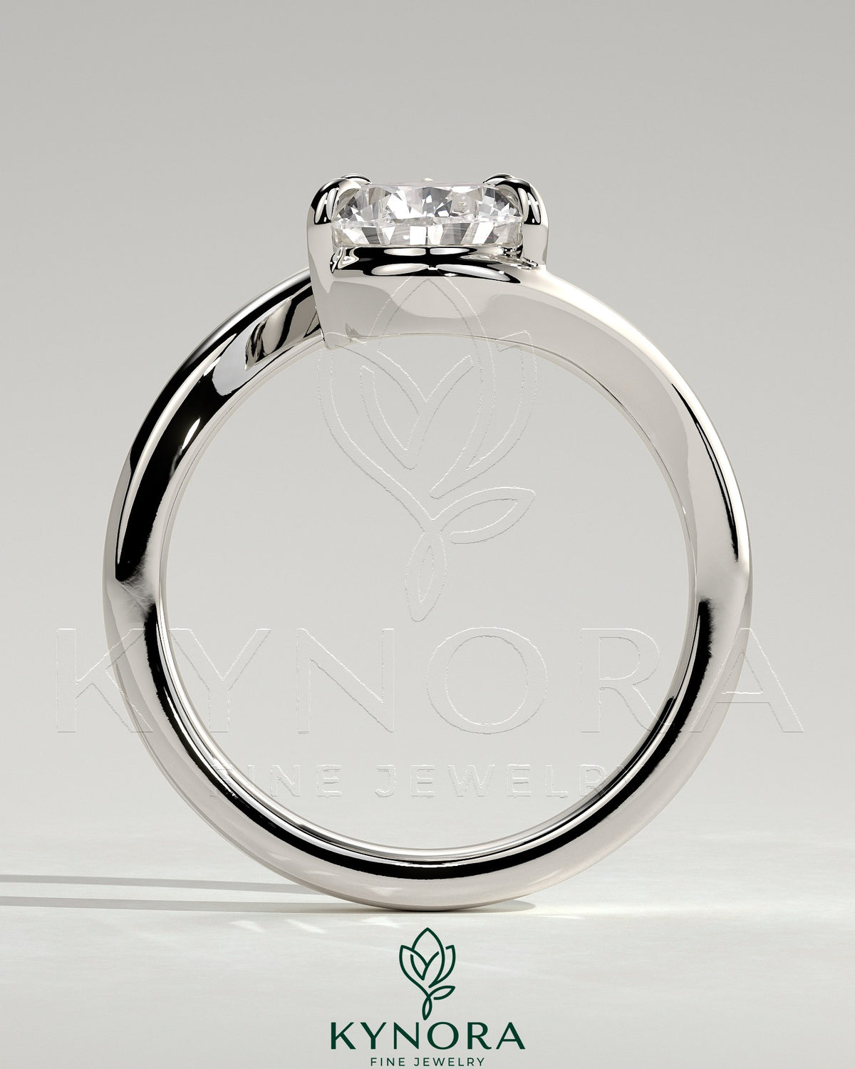 Kynora CJ 2ct pear-shaped diamond solitaire engagement ring with bypass band in silver finish, showcasing elegant design.