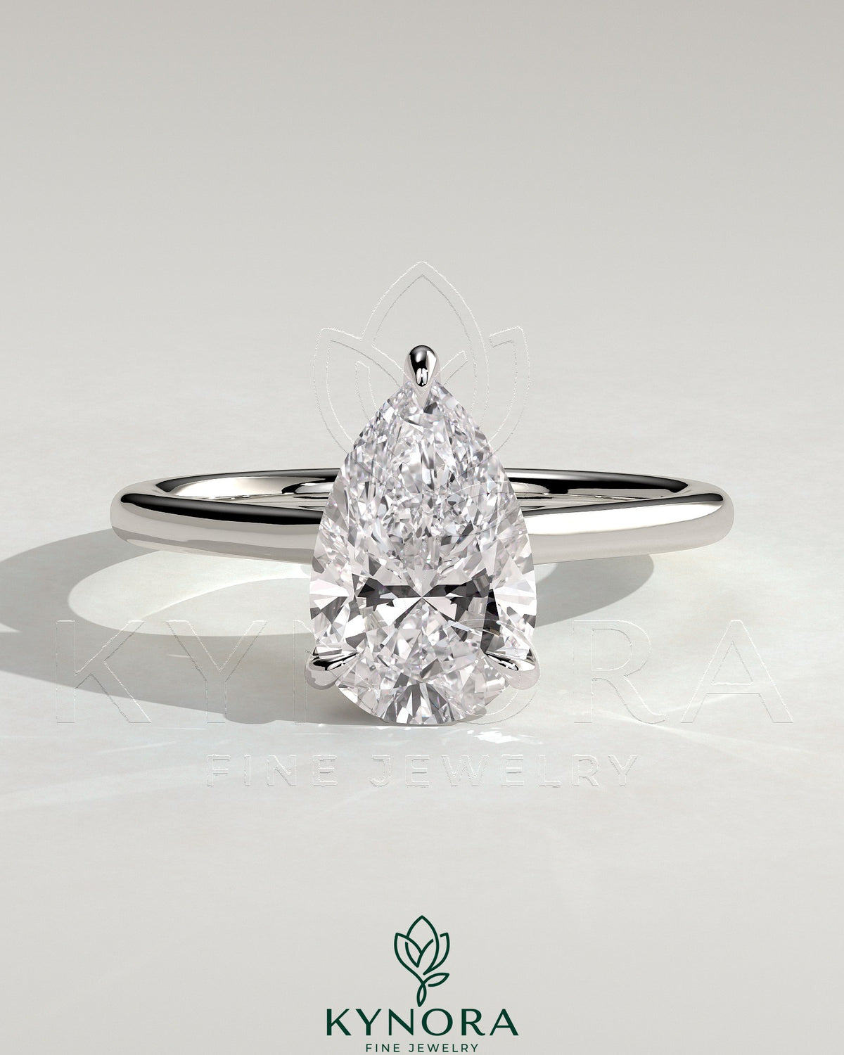 Kynora CJ 2ct pear-shaped moissanite solitaire engagement ring with hidden halo and cathedral high setting in sterling silver.