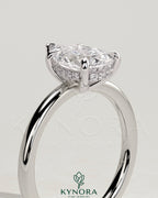 Kynora CJ 2ct pear-shaped diamond solitaire engagement ring with hidden halo and intricate band detail