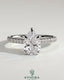 Kynora CJ 2ct pear-shaped diamond solitaire engagement ring with hidden halo, pave band, and cathedral high setting.