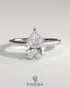 Kynora CJ 2ct pear-shaped diamond solitaire engagement ring with hidden halo, tapered band, and cathedral high setting.