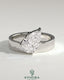 Kynora CJ 2ct pear-shaped diamond solitaire engagement ring with offset angled setting and flat cigar band design.
