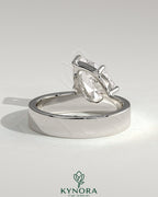 Kynora CJ 2ct pear-shaped diamond solitaire ring with offset setting and flat cigar band engagement ring in gold.
