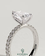 Kynora CJ 2ct pear-shaped diamond solitaire engagement ring with pave band, showcasing elegant design and sparkling gemstone.