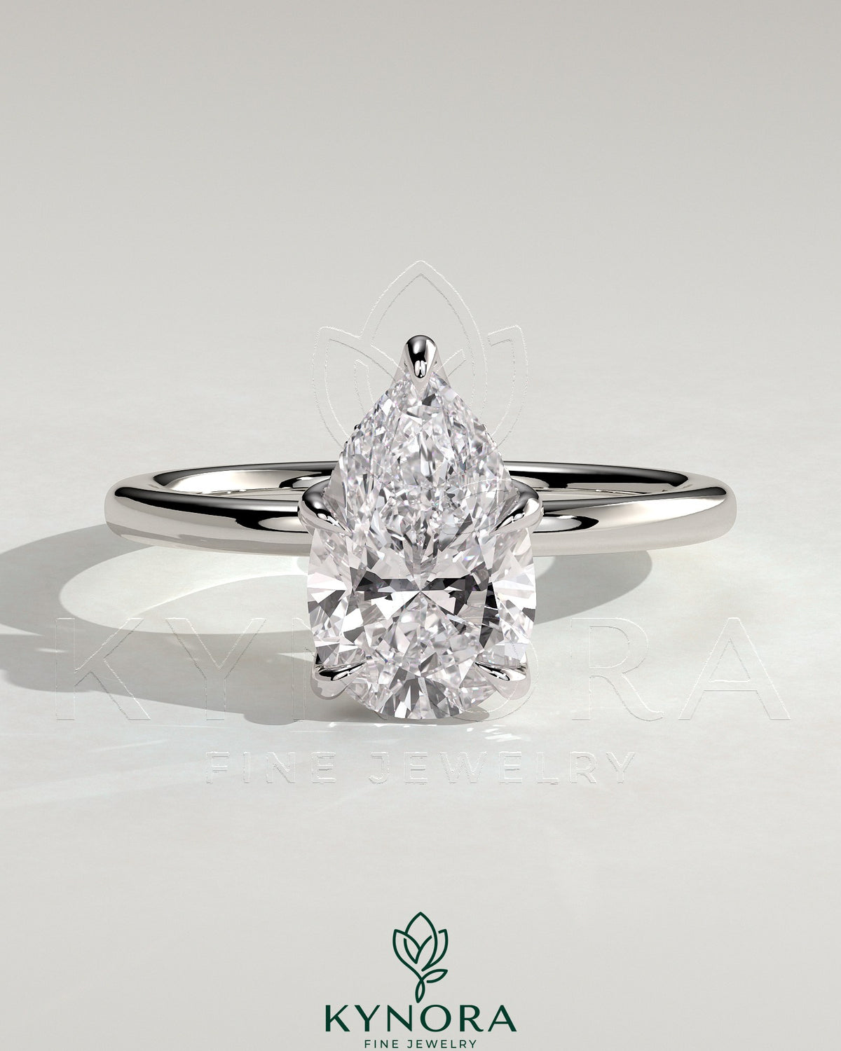 Kynora CJ 2ct pear-shaped diamond solitaire engagement ring with petal gallery and accented tiara detail, silver band. Main image