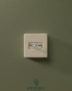 Kynora CJ 2ct pear-shaped diamond solitaire engagement ring with tapered band and cathedral low setting.