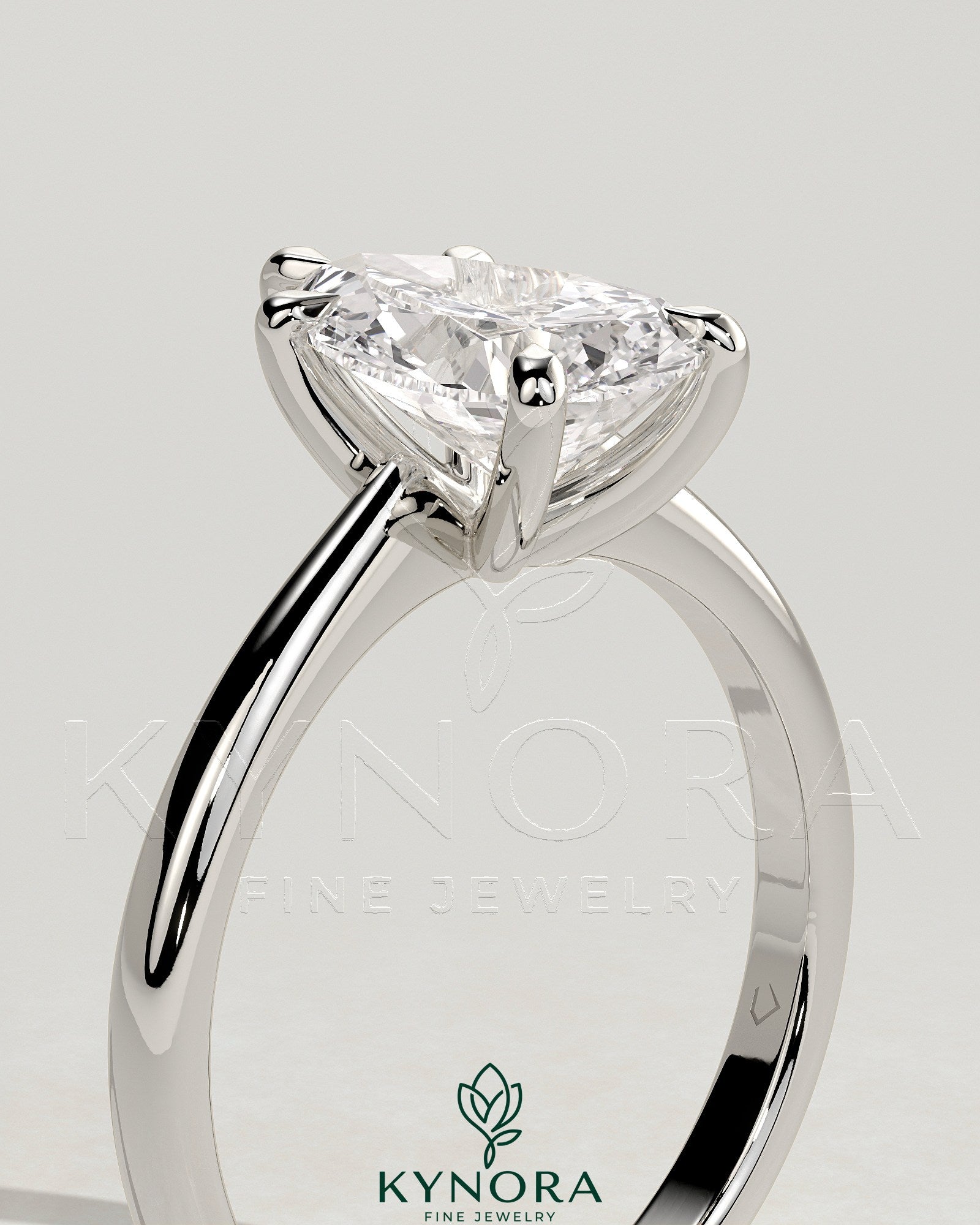 2ct Pear Claw Solitaire with Pinched Tapered Band and Cathedral Low Setting Engagement Ring Secondary image