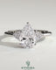 Kynora CJ 2ct pear-shaped diamond solitaire engagement ring with round shoulder stones in a sleek platinum setting.