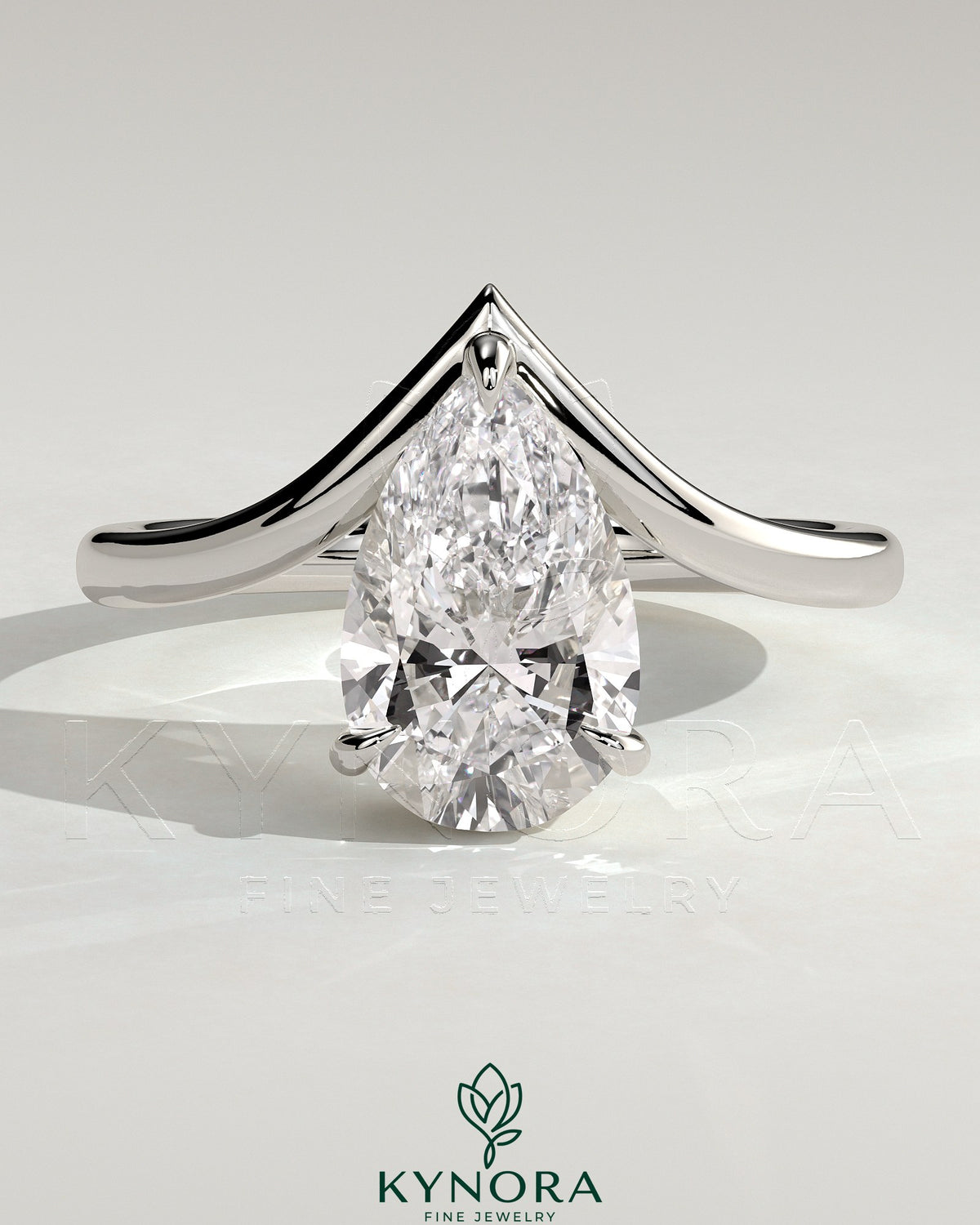 Kynora CJ 2ct pear-shaped diamond solitaire engagement ring with V band, featuring a classic and elegant design. Main image