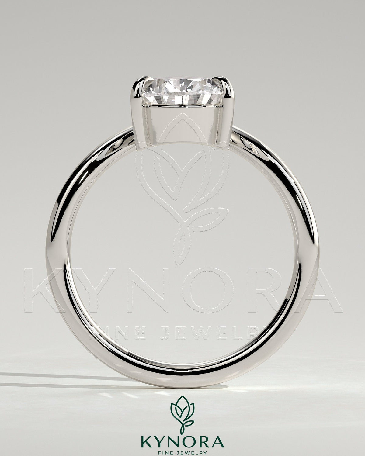 Kynora CJ 2ct pear-shaped diamond solitaire engagement ring with V band design, featuring a sleek, elegant jewelry setting.