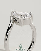 Kynora CJ 2ct pear-shaped diamond solitaire engagement ring with V band in polished metal finish