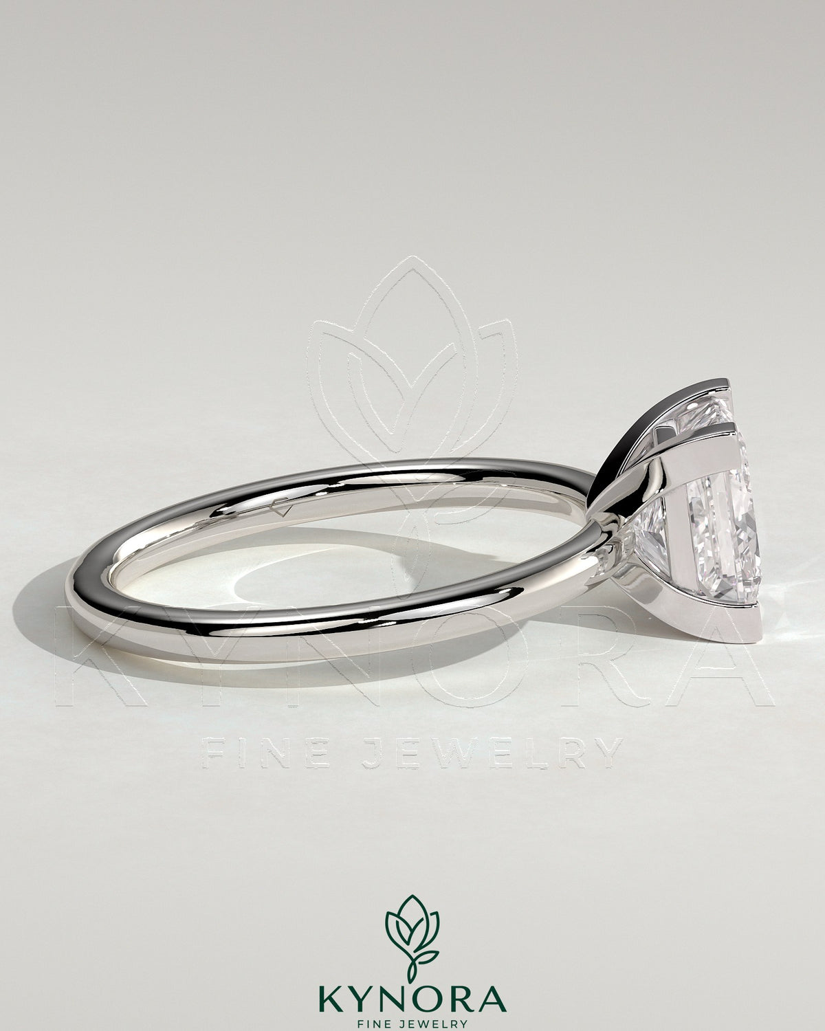 Kynora CJ 2ct princess claw solitaire engagement ring featuring a sparkling diamond set in a sleek band.