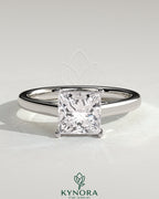 Kynora CJ 2ct princess claw solitaire engagement ring with flat band and cathedral high setting, showcasing sparkling diamond design.