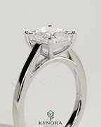 Kynora CJ 2ct princess claw solitaire engagement ring with flat band and cathedral high setting, showcasing a sparkling diamond.