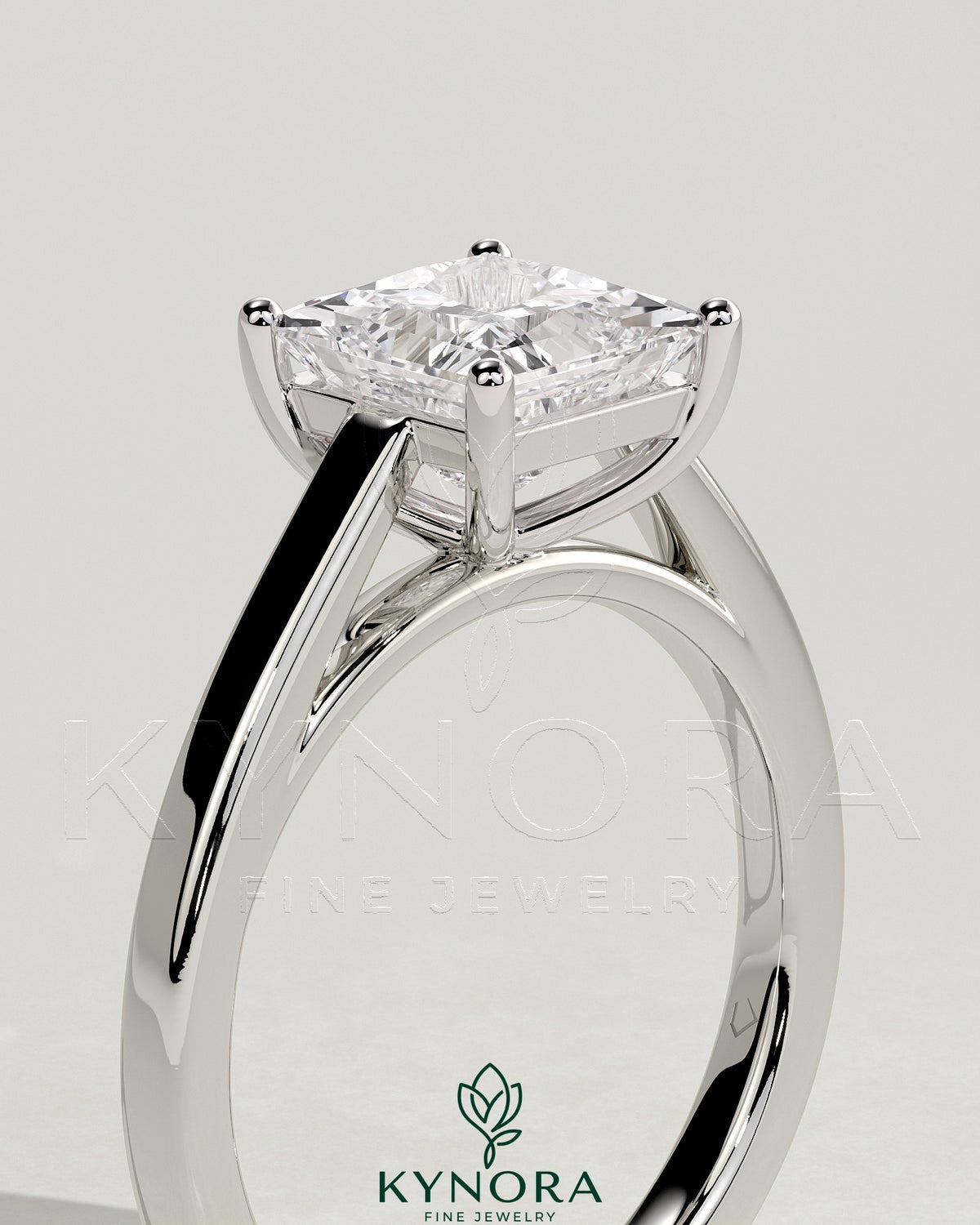 Kynora CJ 2ct princess claw solitaire engagement ring with flat band and cathedral high setting, showcasing a sparkling diamond.