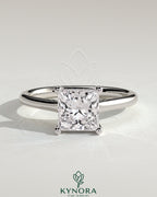 Kynora CJ 2ct princess cut solitaire engagement ring with hidden halo and cathedral high setting, showcasing intricate diamond details.