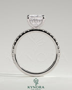Kynora CJ 2ct princess claw solitaire engagement ring with hidden halo and pavé band, featuring a sparkling central diamond.
