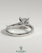 Kynora CJ 2ct princess cut solitaire engagement ring with hidden halo, pave band, and cathedral high setting.