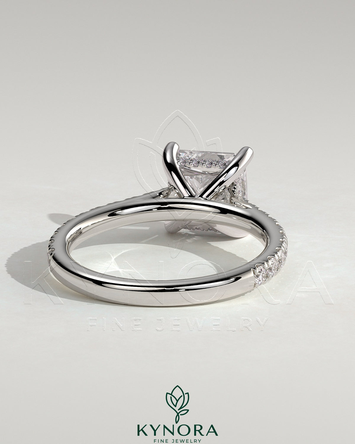 Kynora CJ 2ct princess cut solitaire engagement ring with hidden halo, pave band, and cathedral high setting.
