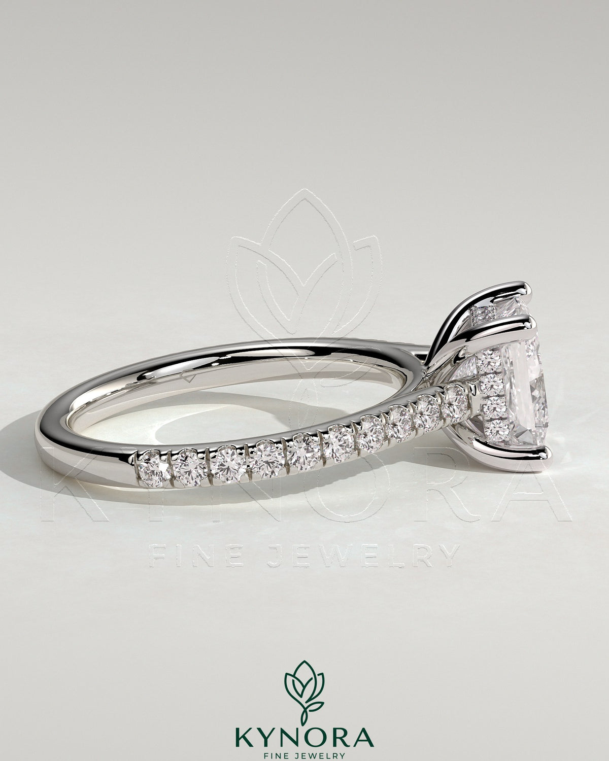 Kynora CJ 2ct princess claw solitaire engagement ring with hidden halo, pave band, and cathedral high setting.