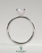 Kynora CJ 2ct radiant cut solitaire engagement ring with claw setting, sparkling diamond, elegant jewelry design