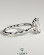 Kynora CJ 2ct radiant claw solitaire engagement ring with cathedral low setting and open trellis gallery in gold.