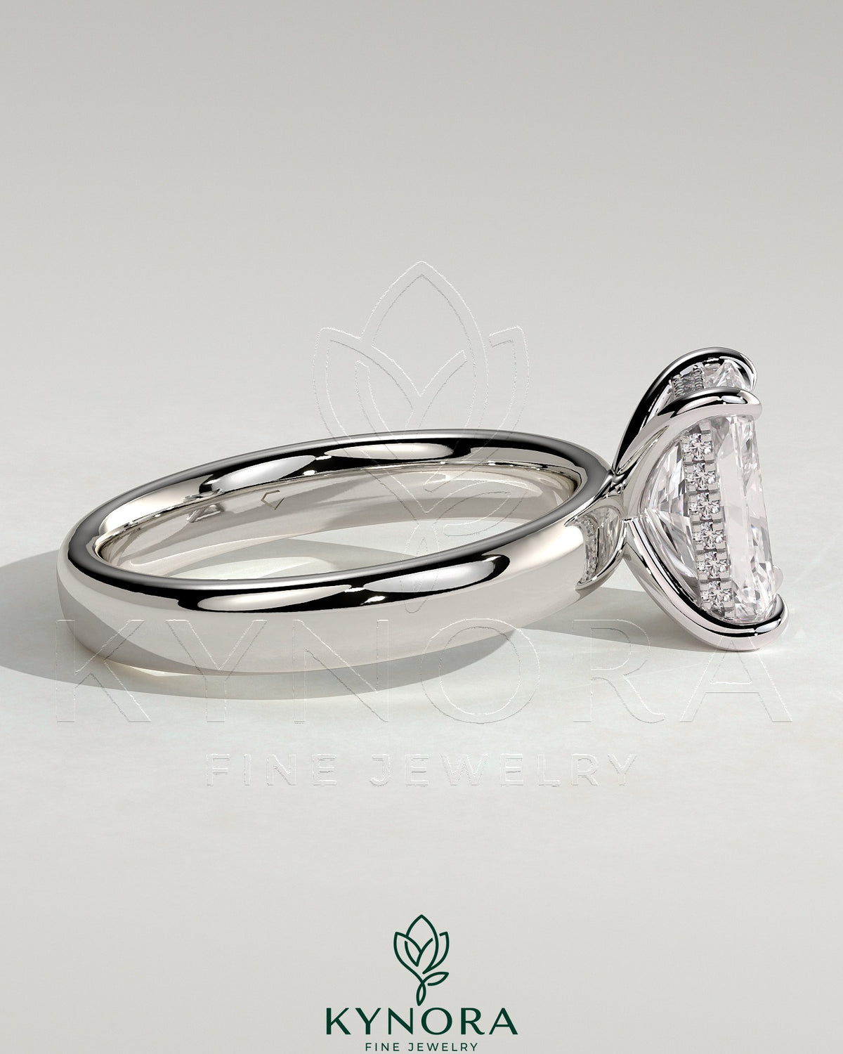 Kynora CJ 2ct radiant cut claw solitaire engagement ring with cigar band and hidden halo, showcasing elegant jewelry craftsmanship.
